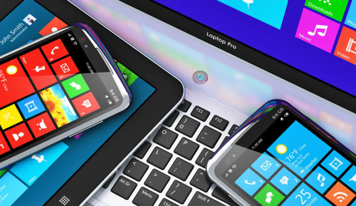 Smartphones, tableta y laptop con íconos de Windows apps