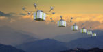 Seis drones surcan el espacio llevando sendos paquetes